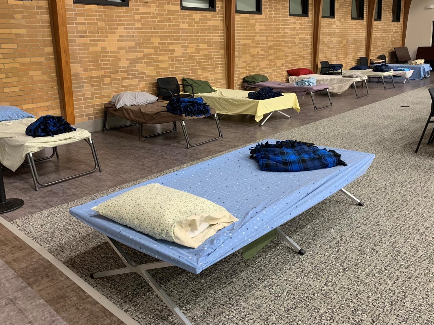 The cots are set up and ready to welcome guests to Jefferson City Room at the Inn, an interchurch emergency shelter that’s open each night in January and February in the Catholic Charities Community Room in Jefferson City.